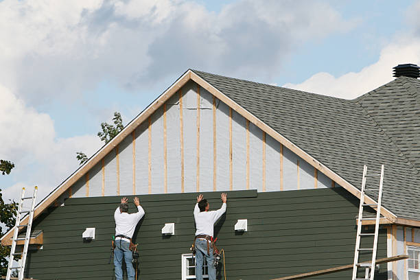 Professional Vinyl Siding technician working in Hebron, PA